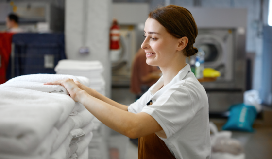 person-is-holding-white-towel-their-hands-firmly